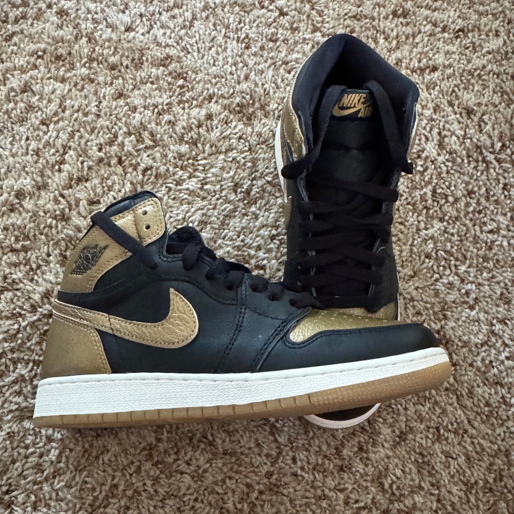 Nike Air Jordan Black and Gold High-Tops
